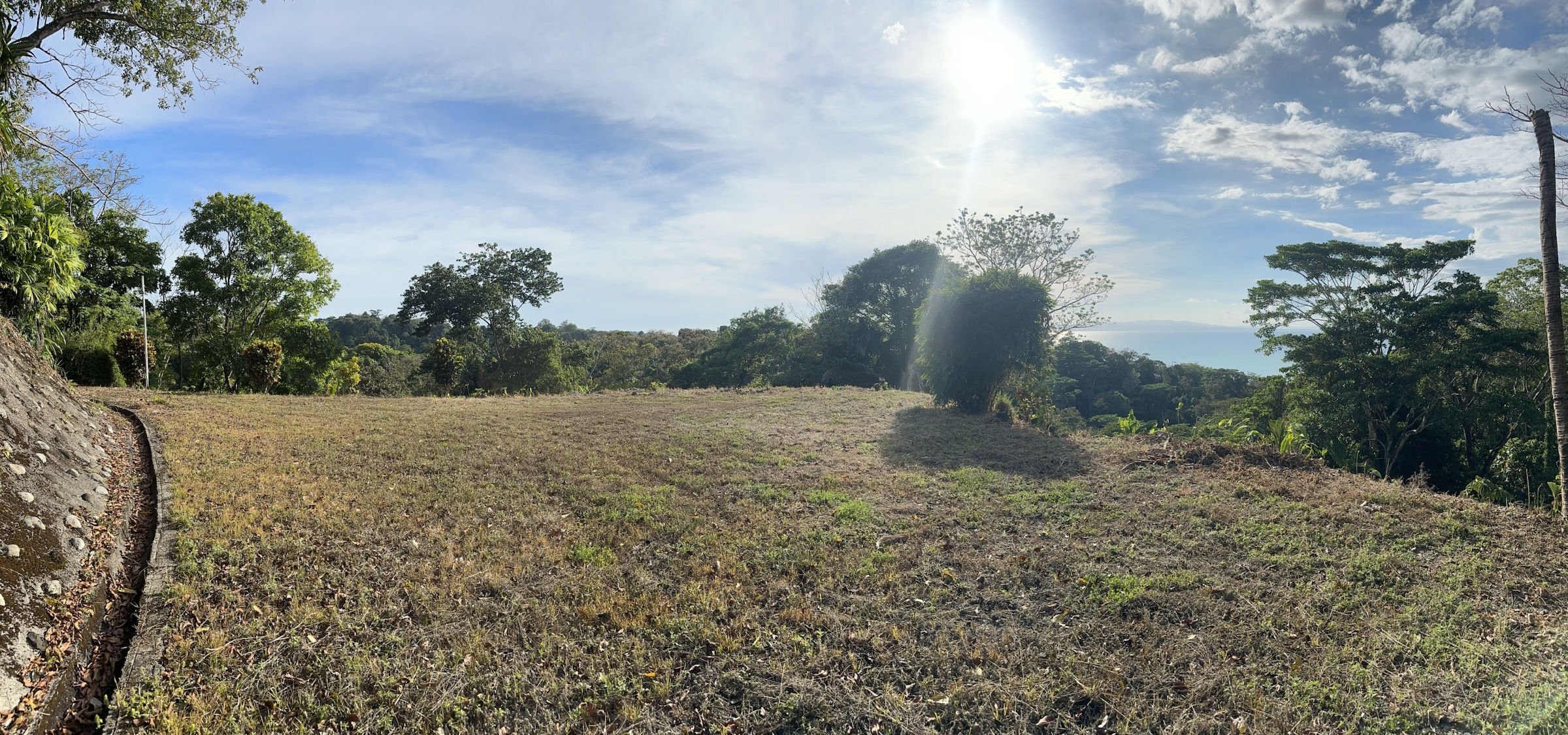 Panoramic level building pad with drainage and ocean view, La Yerba Pavones